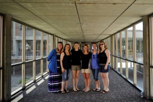 The 2001 grads pause for a quick photo in the link. (L-R) Erica Huls, Laura Waldon, Sara Thedinga, Stacy (Waterman) Newton, Emily Waldon, and Melon.